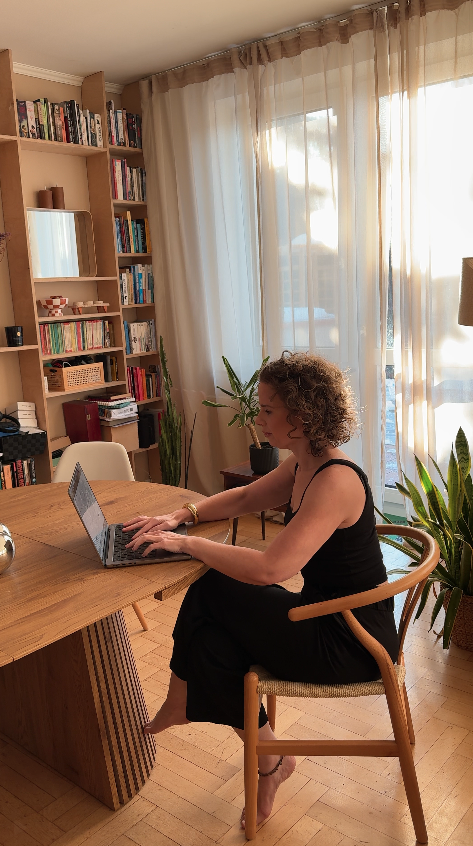 Ivy working from laptop